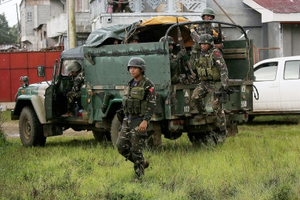 Philippine troops kill suspected militant in clash | Philippine troops kill suspected militant in clash