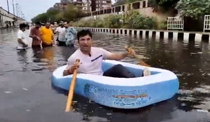 BJP Councillor takes 'boat ride' in waterlogged Patparganj, slams AAP govt | BJP Councillor takes 'boat ride' in waterlogged Patparganj, slams AAP govt BJP Councillor takes 'boat ride' in waterlogged Patparganj, slams AAP govt | BJP Councillor takes 'boat ride' in waterlogged Patparganj, slams AAP govt