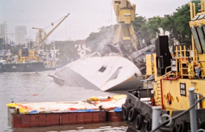 Indian Navy frigate Brahmaputra fully tilts onto one side after onboard fire at Mumbai dockyard | Indian Navy frigate Brahmaputra fully tilts onto one side after onboard fire at Mumbai dockyard Indian Navy frigate Brahmaputra fully tilts onto one side after onboard fire at Mumbai dockyard | Indian Navy frigate Brahmaputra fully tilts onto one side after onboard fire at Mumbai dockyard