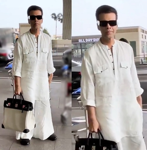 Karan Johar breaks his airport fashion stereotype with sombre outfit | Karan Johar breaks his airport fashion stereotype with sombre outfit Karan Johar breaks his airport fashion stereotype with sombre outfit | Karan Johar breaks his airport fashion stereotype with sombre outfit
