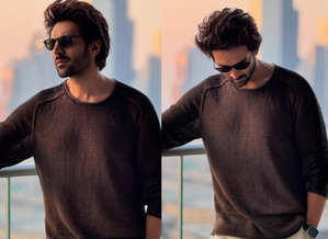 Kartik Aaryan channels Rooh Baba as he poses on top of Burj Khalifa | Kartik Aaryan channels Rooh Baba as he poses on top of Burj Khalifa Kartik Aaryan channels Rooh Baba as he poses on top of Burj Khalifa | Kartik Aaryan channels Rooh Baba as he poses on top of Burj Khalifa