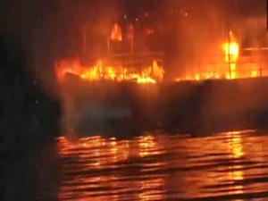 Three injured as two boats catch fire in Hyderabad’s Hussain Sagar lake | Three injured as two boats catch fire in Hyderabad’s Hussain Sagar lake Three injured as two boats catch fire in Hyderabad’s Hussain Sagar lake | Three injured as two boats catch fire in Hyderabad’s Hussain Sagar lake