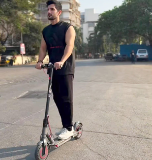 Aditya Seal takes e-scooter to work to reduce carbon footprint | Aditya Seal takes e-scooter to work to reduce carbon footprint Aditya Seal takes e-scooter to work to reduce carbon footprint | Aditya Seal takes e-scooter to work to reduce carbon footprint