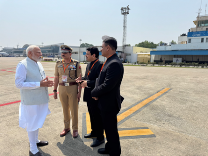 Strong image, stronger message: PM Modi's stern airport huddle reflects 'zero-tolerance' stance on law and order | Strong image, stronger message: PM Modi's stern airport huddle reflects 'zero-tolerance' stance on law and order Strong image, stronger message: PM Modi's stern airport huddle reflects 'zero-tolerance' stance on law and order | Strong image, stronger message: PM Modi's stern airport huddle reflects 'zero-tolerance' stance on law and order