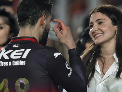 A moment stamped in history: Anushka hugs hubby Virat as his RCB registers maiden IPL win | A moment stamped in history: Anushka hugs hubby Virat as his RCB registers maiden IPL win A moment stamped in history: Anushka hugs hubby Virat as his RCB registers maiden IPL win | A moment stamped in history: Anushka hugs hubby Virat as his RCB registers maiden IPL win