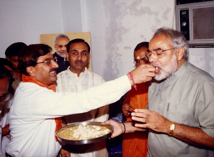 Through smiles, silence & sweets: The unspoken bond between PM Modi and Vijay Rupani | Through smiles, silence & sweets: The unspoken bond between PM Modi and Vijay Rupani Through smiles, silence & sweets: The unspoken bond between PM Modi and Vijay Rupani | Through smiles, silence & sweets: The unspoken bond between PM Modi and Vijay Rupani