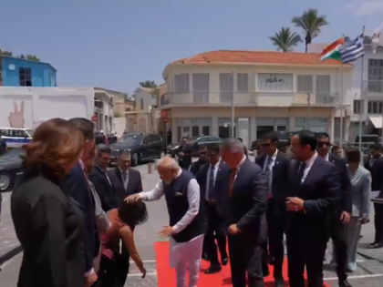 Cyprus leader touches PM Modi's feet in touching gesture of respect | Cyprus leader touches PM Modi's feet in touching gesture of respect Cyprus leader touches PM Modi's feet in touching gesture of respect | Cyprus leader touches PM Modi's feet in touching gesture of respect