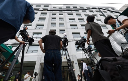 South Korea: Special counsel team raids construction company in probe into ex-first lady | South Korea: Special counsel team raids construction company in probe into ex-first lady