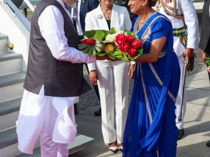 PM Modi arrives to grand reception in Trinidad & Tobago; welcomed by PM Kamla Persad-Bissessar | PM Modi arrives to grand reception in Trinidad & Tobago; welcomed by PM Kamla Persad-Bissessar PM Modi arrives to grand reception in Trinidad & Tobago; welcomed by PM Kamla Persad-Bissessar | PM Modi arrives to grand reception in Trinidad & Tobago; welcomed by PM Kamla Persad-Bissessar