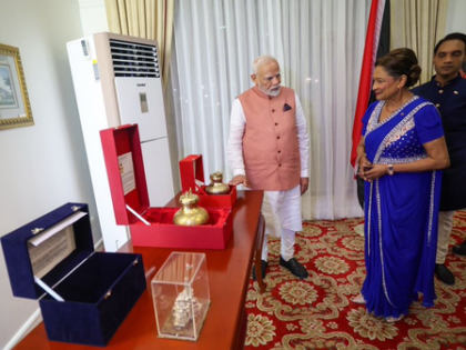 PM Modi presents Ram Mandir replica, holy water from Saryu river to Trinidad & Tobago PM | PM Modi presents Ram Mandir replica, holy water from Saryu river to Trinidad & Tobago PM PM Modi presents Ram Mandir replica, holy water from Saryu river to Trinidad & Tobago PM | PM Modi presents Ram Mandir replica, holy water from Saryu river to Trinidad & Tobago PM