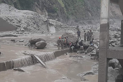 Flash floods wash away Nepal-China trade route, leave 8 dead | Flash floods wash away Nepal-China trade route, leave 8 dead