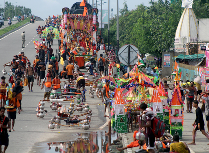 Uttar Pradesh gears up for Kanwar Yatra amid tight security arrangements | Uttar Pradesh gears up for Kanwar Yatra amid tight security arrangements Uttar Pradesh gears up for Kanwar Yatra amid tight security arrangements | Uttar Pradesh gears up for Kanwar Yatra amid tight security arrangements