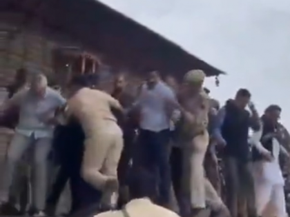 CM Omar Abdullah climbs graveyard gate, grapples with security men amid Martyrs' Day row | CM Omar Abdullah climbs graveyard gate, grapples with security men amid Martyrs' Day row CM Omar Abdullah climbs graveyard gate, grapples with security men amid Martyrs' Day row | CM Omar Abdullah climbs graveyard gate, grapples with security men amid Martyrs' Day row