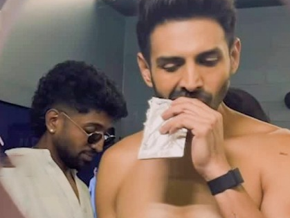 Kartik Aaryan recreates Coldplay kiss cam viral video; What is he cheating on? | Kartik Aaryan recreates Coldplay kiss cam viral video; What is he cheating on? Kartik Aaryan recreates Coldplay kiss cam viral video; What is he cheating on? | Kartik Aaryan recreates Coldplay kiss cam viral video; What is he cheating on?