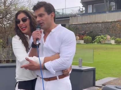 Bipasha Basu hugs hubby Karan as he channels his inner Elvis Presley | Bipasha Basu hugs hubby Karan as he channels his inner Elvis Presley Bipasha Basu hugs hubby Karan as he channels his inner Elvis Presley | Bipasha Basu hugs hubby Karan as he channels his inner Elvis Presley