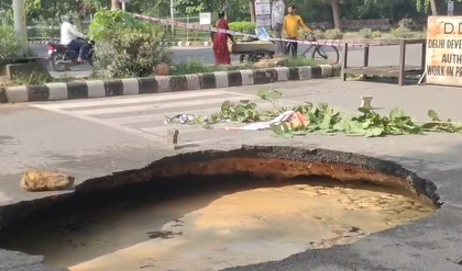 Road caves in near National Law University in Delhi's Dwarka | Road caves in near National Law University in Delhi's Dwarka Road caves in near National Law University in Delhi's Dwarka | Road caves in near National Law University in Delhi's Dwarka