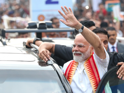 PM Modi reaches Jharsuguda Airport to a rousing welcome | PM Modi reaches Jharsuguda Airport to a rousing welcome