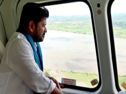 Telangana CM conducts aerial survey of flood-hit districts | Telangana CM conducts aerial survey of flood-hit districts Telangana CM conducts aerial survey of flood-hit districts | Telangana CM conducts aerial survey of flood-hit districts