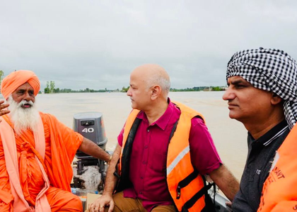 Wading through waist-deep waters in Punjab, it's generosity, kindness that float | Wading through waist-deep waters in Punjab, it's generosity, kindness that float Wading through waist-deep waters in Punjab, it's generosity, kindness that float | Wading through waist-deep waters in Punjab, it's generosity, kindness that float