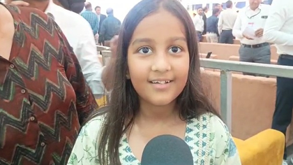 Gujarat: Girl presents photo collage during Bhavnagar rally depicting PM Modi’s moments with his mother | Gujarat: Girl presents photo collage during Bhavnagar rally depicting PM Modi’s moments with his mother