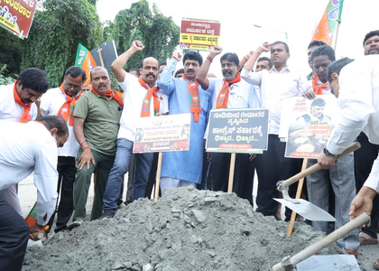 K'taka BJP launches statewide protest against Cong govt over pothole-ridden roads | K'taka BJP launches statewide protest against Cong govt over pothole-ridden roads