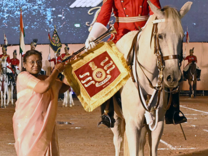 President Murmu presents special honour to her bodyguard | President Murmu presents special honour to her bodyguard