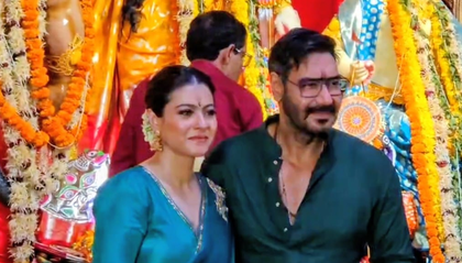 Ajay Devgn & Kajol twin in green during the Maha Navmi celebration | Ajay Devgn & Kajol twin in green during the Maha Navmi celebration