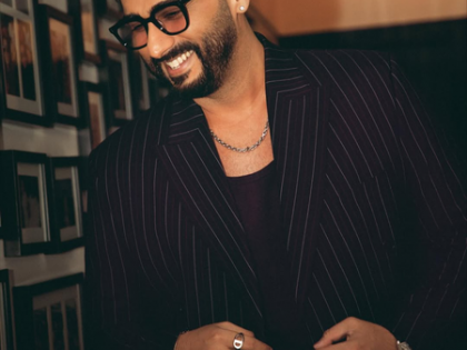 Arjun Kapoor flaunts his ‘happy face’ for an early morning flight | Arjun Kapoor flaunts his ‘happy face’ for an early morning flight