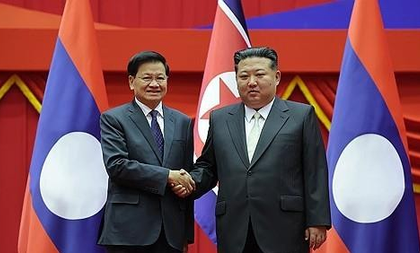 North Korea's Kim holds talks with Laos president in Pyongyang | North Korea's Kim holds talks with Laos president in Pyongyang