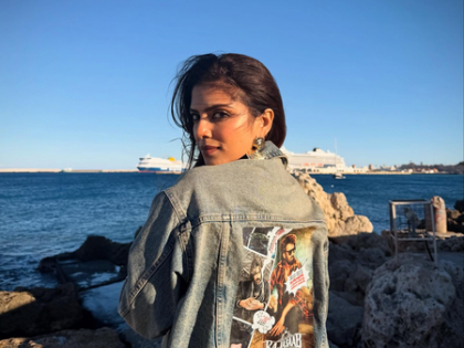 After director Maruthi, actress Malavika Mohanan now sports outfit bearing 'The Raja Saab' poster in Greece | After director Maruthi, actress Malavika Mohanan now sports outfit bearing 'The Raja Saab' poster in Greece After director Maruthi, actress Malavika Mohanan now sports outfit bearing 'The Raja Saab' poster in Greece | After director Maruthi, actress Malavika Mohanan now sports outfit bearing 'The Raja Saab' poster in Greece