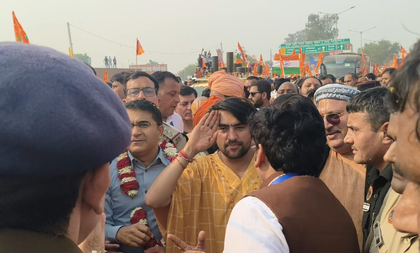 During Sanatan Yatra, Dhirendra Shastri's salute to ASP Anuj Chaudhary wins hearts in Mathura | During Sanatan Yatra, Dhirendra Shastri's salute to ASP Anuj Chaudhary wins hearts in Mathura