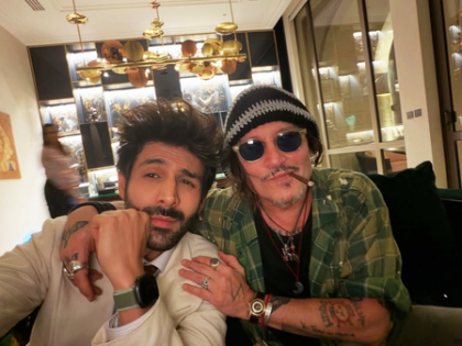 ‘Rooh Baba’ Kartik Aaryan poses for a picture with ‘Jack Sparrow’ Johnny Depp | ‘Rooh Baba’ Kartik Aaryan poses for a picture with ‘Jack Sparrow’ Johnny Depp