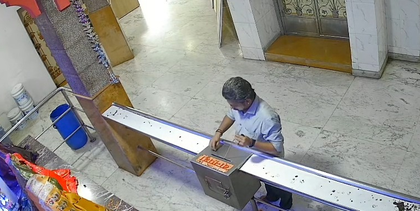 Thief caught red-handed stealing from Siddhivinayak Temple donation box | Thief caught red-handed stealing from Siddhivinayak Temple donation box Thief caught red-handed stealing from Siddhivinayak Temple donation box | Thief caught red-handed stealing from Siddhivinayak Temple donation box
