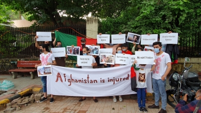 Afghan nationals in Delhi protest against Pakistan | Afghan nationals in Delhi protest against Pakistan
