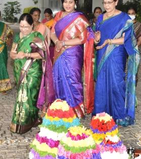 Telangana CM's wife, daughter-in-law take part in Bathukamma | Telangana CM's wife, daughter-in-law take part in Bathukamma