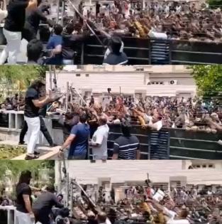 Cheering fans throng Allu Arjun's home on b'day, 'Pushpa' star waves at them | Cheering fans throng Allu Arjun's home on b'day, 'Pushpa' star waves at them