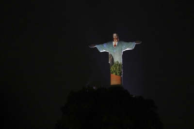 Brazil's Christ the Redeemer lit up to honour medics | Brazil's Christ the Redeemer lit up to honour medics