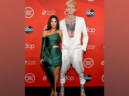 Newly engaged Machine Gun Kelly, Megan Fox rock red carpet at fashion show | Newly engaged Machine Gun Kelly, Megan Fox rock red carpet at fashion show