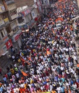 Thousands take out silent march in Udaipur, demand capital punishment for Kanhaiya Lal's killers | Thousands take out silent march in Udaipur, demand capital punishment for Kanhaiya Lal's killers Thousands take out silent march in Udaipur, demand capital punishment for Kanhaiya Lal's killers | Thousands take out silent march in Udaipur, demand capital punishment for Kanhaiya Lal's killers