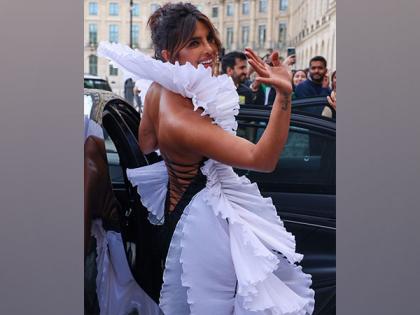 Priyanka takes over Paris in a beautiful black evening gown! | Priyanka takes over Paris in a beautiful black evening gown!