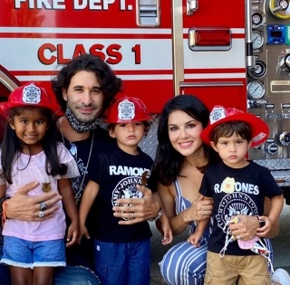 Sunny Leone, family have a day out with firemen | Sunny Leone, family have a day out with firemen