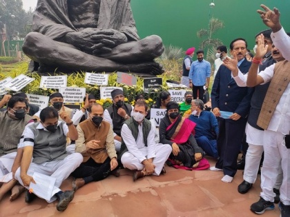Winter session: Opposition leaders stage protest wearing black bands in Parliament against suspension of 12 MPs | Winter session: Opposition leaders stage protest wearing black bands in Parliament against suspension of 12 MPs