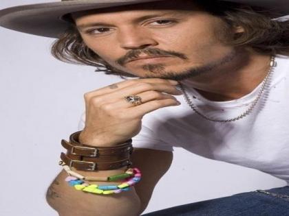 Johnny Depp sells his signed self-portrait for charity | Johnny Depp sells his signed self-portrait for charity Johnny Depp sells his signed self-portrait for charity | Johnny Depp sells his signed self-portrait for charity
