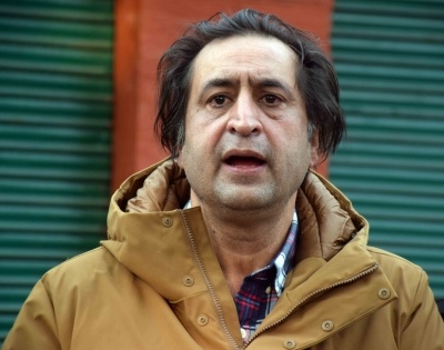 Sajad Lone pays tribute to 2 cops killed by terrorists | Sajad Lone pays tribute to 2 cops killed by terrorists