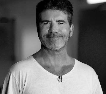 Simon Cowell hospitalised with broken back | Simon Cowell hospitalised with broken back
