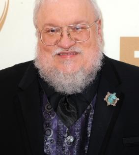 George R.R. Martin misses 'House of the Dragon' premiere after testing Covid positive | George R.R. Martin misses 'House of the Dragon' premiere after testing Covid positive