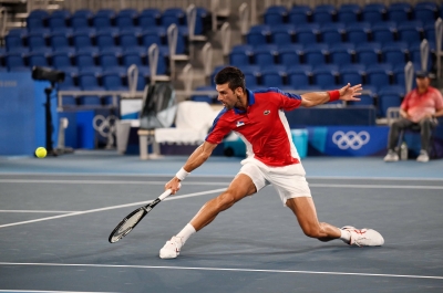 Djokovic secures QF berth, on course for calendar-year Grand Slam | Djokovic secures QF berth, on course for calendar-year Grand Slam