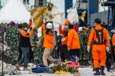 Indonesian officials identify body of crashed plane's pilot | Indonesian officials identify body of crashed plane's pilot