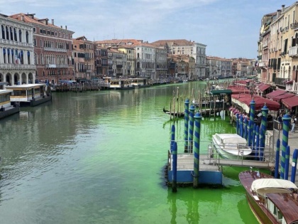 Authorities launch probe after canal water in Venice turns fluorescent green | Authorities launch probe after canal water in Venice turns fluorescent green