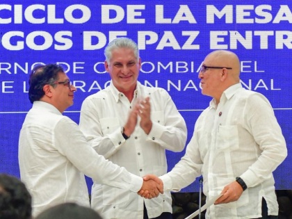 Colombian govt, guerrilla group sign 6-month ceasefire | Colombian govt, guerrilla group sign 6-month ceasefire